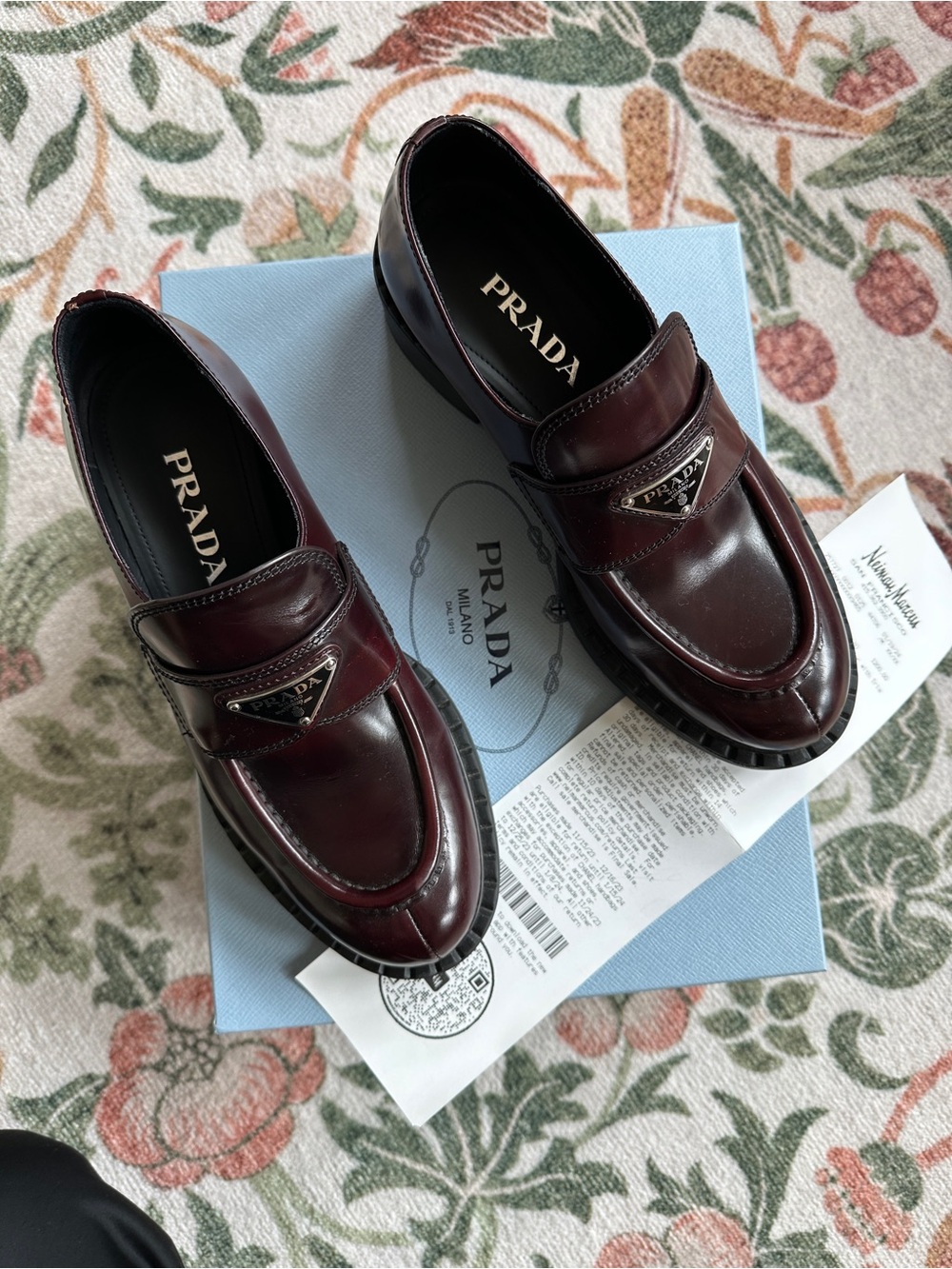 Prada women’s Burgundy Leather triangle Loafers